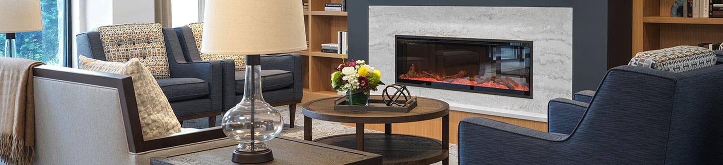 Cozy common area with a fireplace and seating