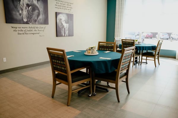 Dining area with tables set for meals