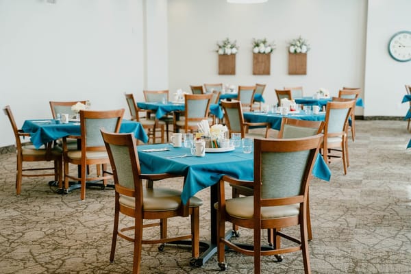 Dining area with tables and flowers