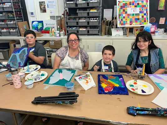 Residents and staff participating in an art activity