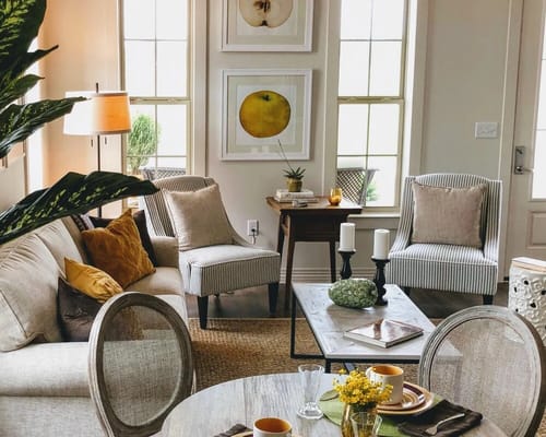 Bright common room with comfortable seating and decor