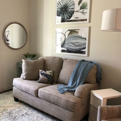 Cozy sitting area with a sofa and decorations