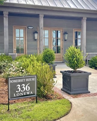 Exterior view of Somerset House with greenery