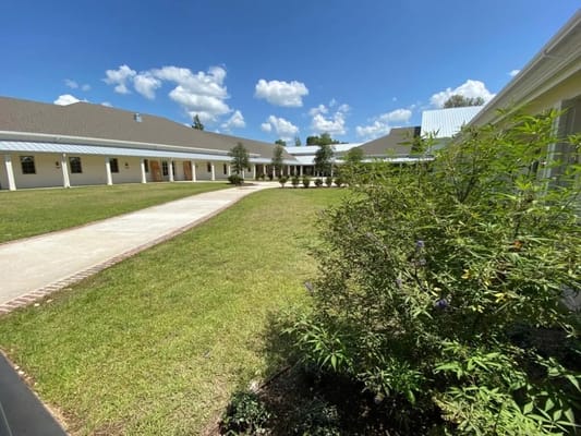 Outdoor view of the facility grounds and building