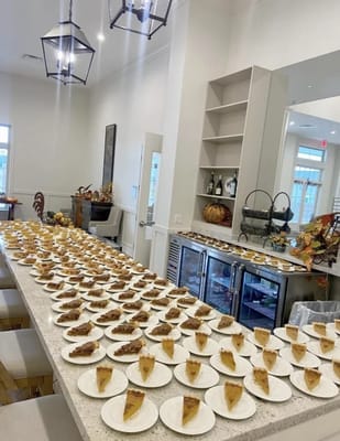 A tabletop display of individual pie servings for residents