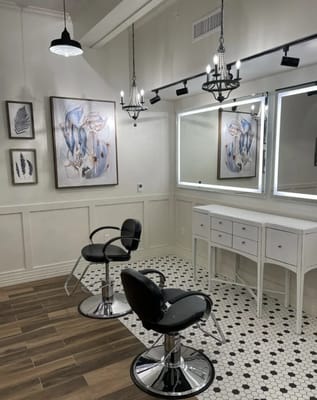 Interior view of a beauty salon with styling chairs