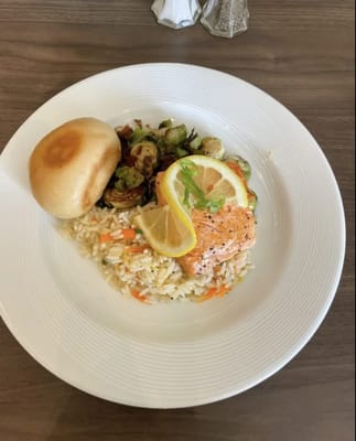 Plate of salmon with rice and vegetables