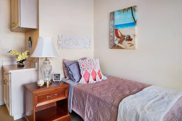 Cozy resident room with beach-themed decor
