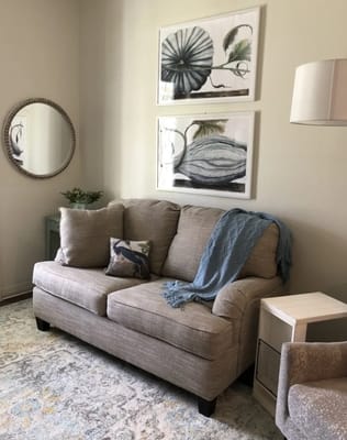 Cozy sitting area with a couch and decor