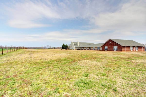 Exterior view of assisted living facility with open space
