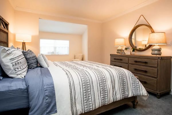 Well-furnished private bedroom in assisted living facility
