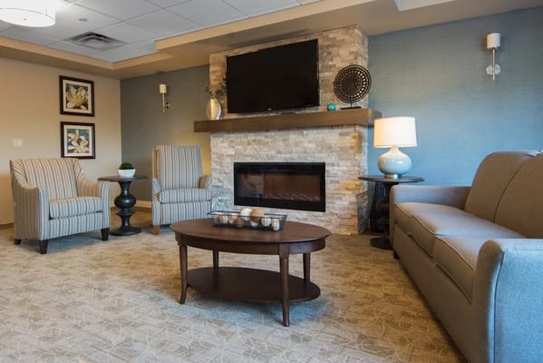 Interior common area with comfortable seating and fireplace