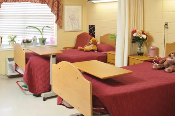 A cozy private resident room with two beds