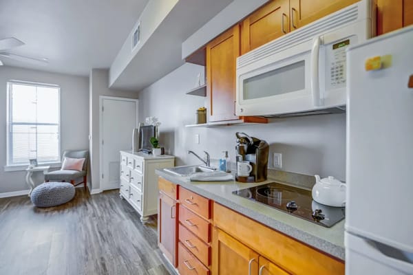 Bright, modern kitchen area in a senior living facility