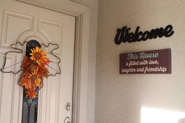 Welcoming entrance with autumn decorations