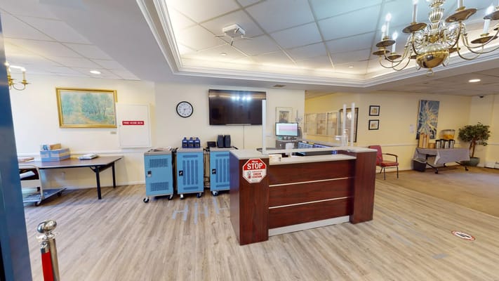 Interior view of a reception area with a desk