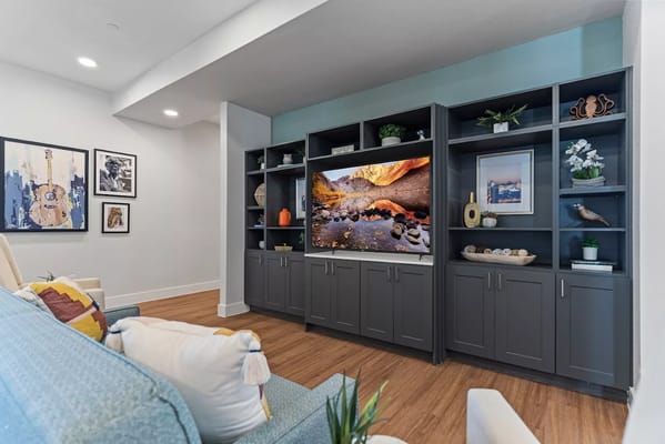 Interior common area with a television and seating