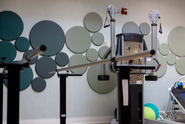 Interior view of a fitness area with equipment and decor