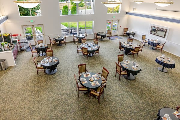Dining area with set tables and outdoor view