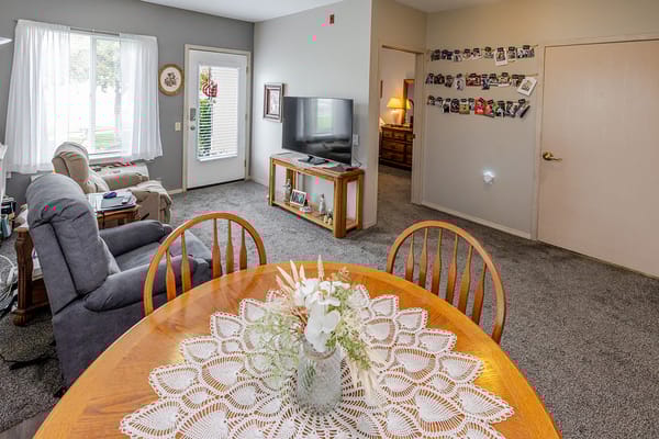 Cozy interior space of a resident room with a dining table