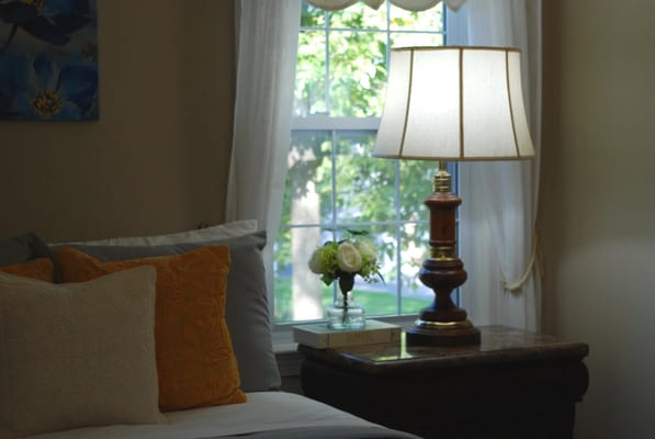 Cozy room with a lamp and decorative pillows