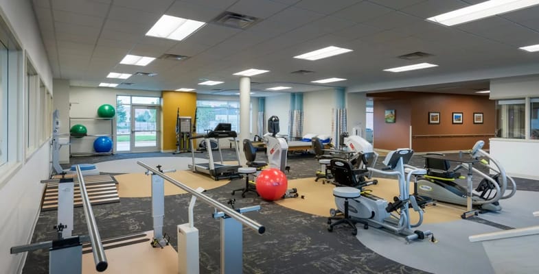 Interior view of a fitness room with exercise equipment