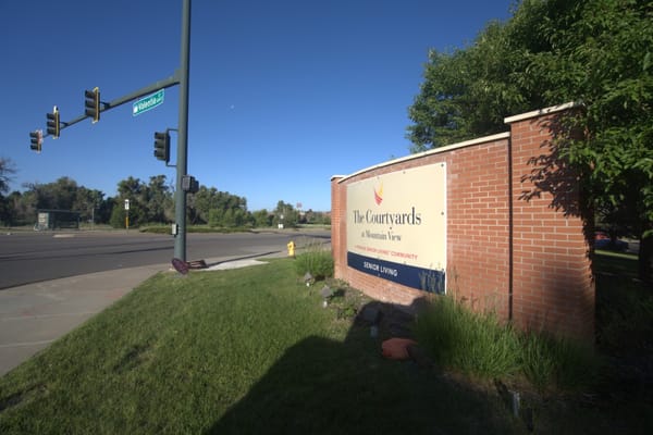 Sign for The Courtyards at Mountain View senior living community