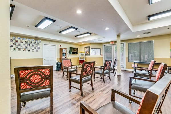 Bright common area with chairs arranged neatly