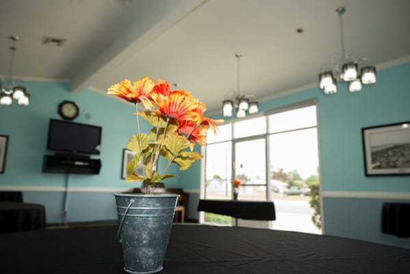 Indoor flower arrangement in a dining area