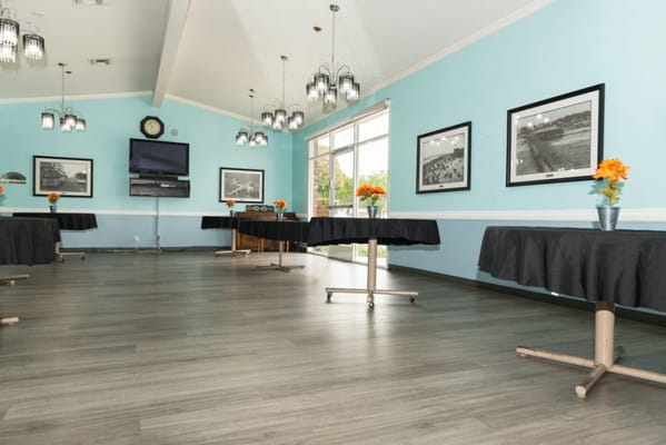 Interior view of a common area with tables and decor