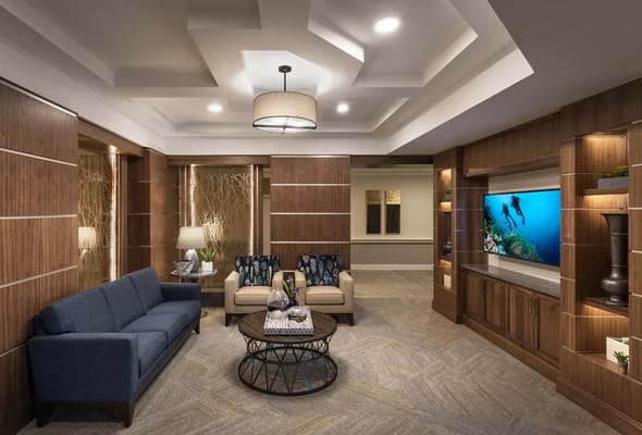 Interior common area with seating and an aquarium