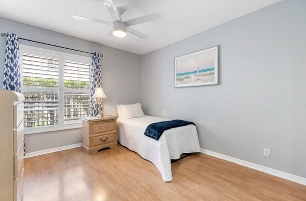 Cozy private room with a bed and natural light