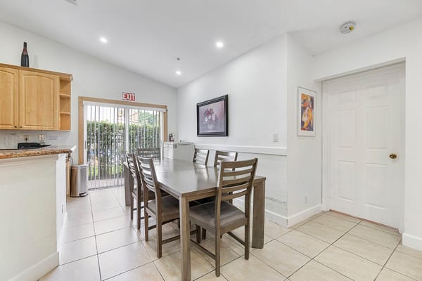 Interior view of a dining area with a long table