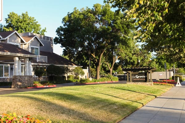 Exterior view of The Grove Senior Living facility