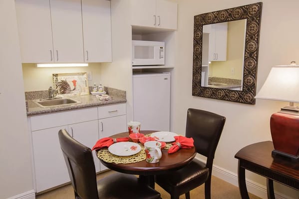 Cozy dining area with table set for a meal