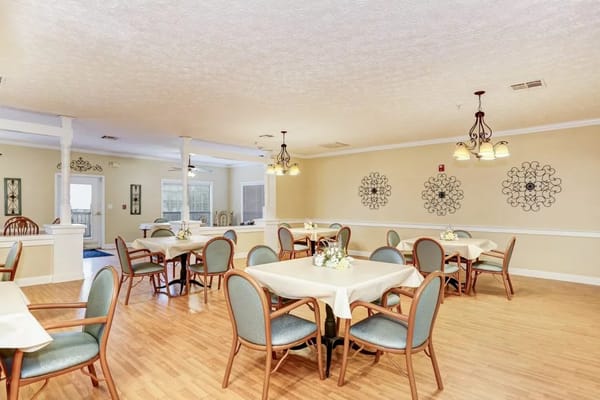 Dining area with tables and chairs arranged neatly