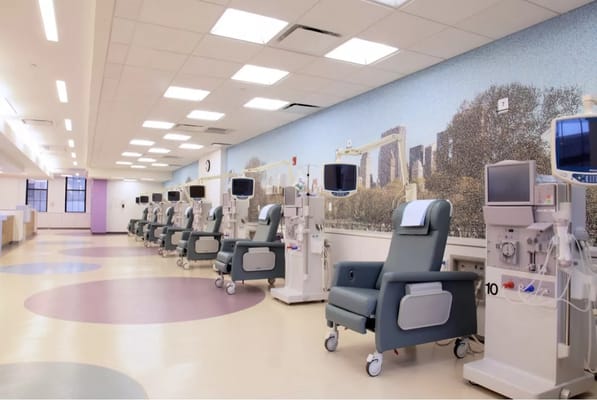 Interior view of a treatment area with chairs and equipment