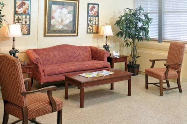 Living room with seating and decorative plants