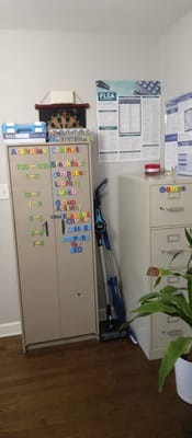 Colorful activities cabinet with schedule and posters