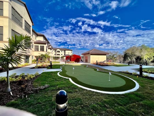 Outdoor putting green in a senior living community