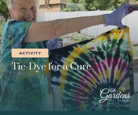 Resident participating in a tie-dye activity