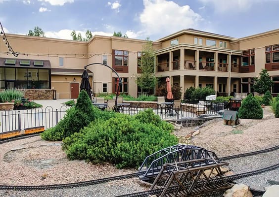 Beautiful outdoor garden area with seating and landscaping