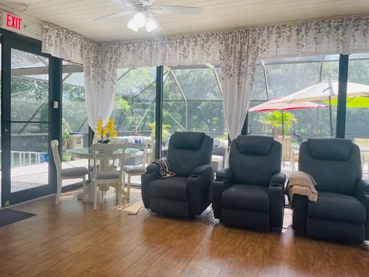 Indoor common area with comfortable seating and views of the outdoors