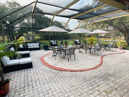 Outdoor courtyard with seating and umbrellas
