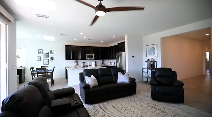 Bright and modern living room with kitchen view