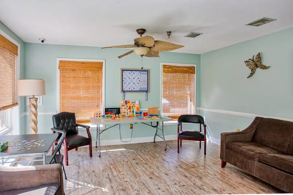 Bright common area with games and seating
