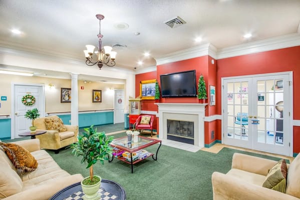 Interior common area with seating and fireplace