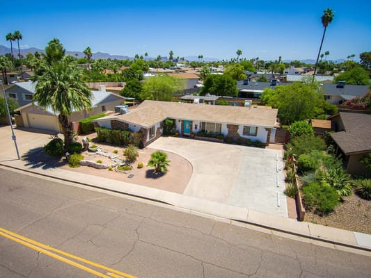 Front view of Best Elderly Care facility with landscaped garden