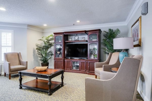 Common area with seating and a television