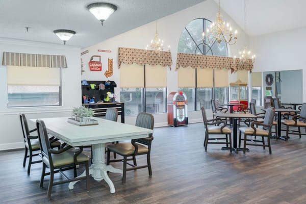 Bright common area with tables and seating